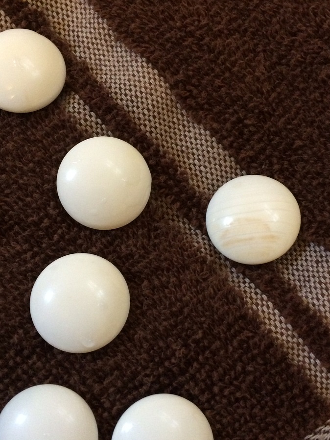 The one with the big brown spot, looking less brown but still present. Even if the H2O2 doesn't knock it completely off, I honestly appreciate the character.