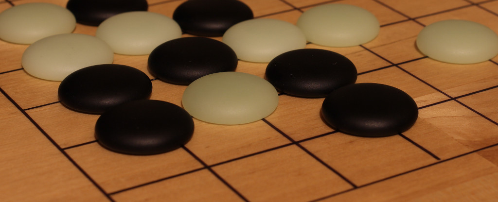 The translucency of the white stones varies a bit - I think this stone at the front got a bit more jade in the mix, so it's a bit more translucent and looks a bit darker.